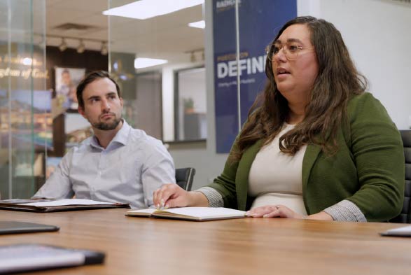 Woman and man at a meeting table